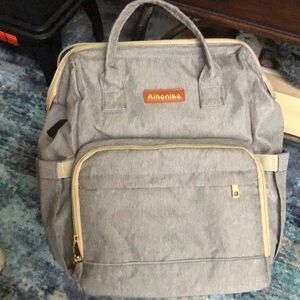 Aihonika laptop. Backpack, diaper bag! Never used. Excellent! New without tags